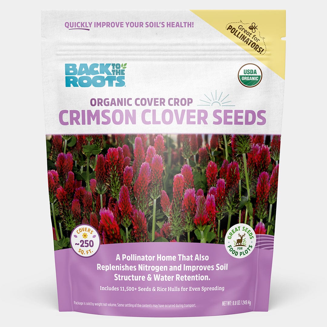 A bag of Back to the Roots Organic Crimson Clover Cover Crop Seeds, featuring vibrant red flowers and text highlighting pollinator benefits, soil health, nitrogen replenishment, and USDA organic certification.