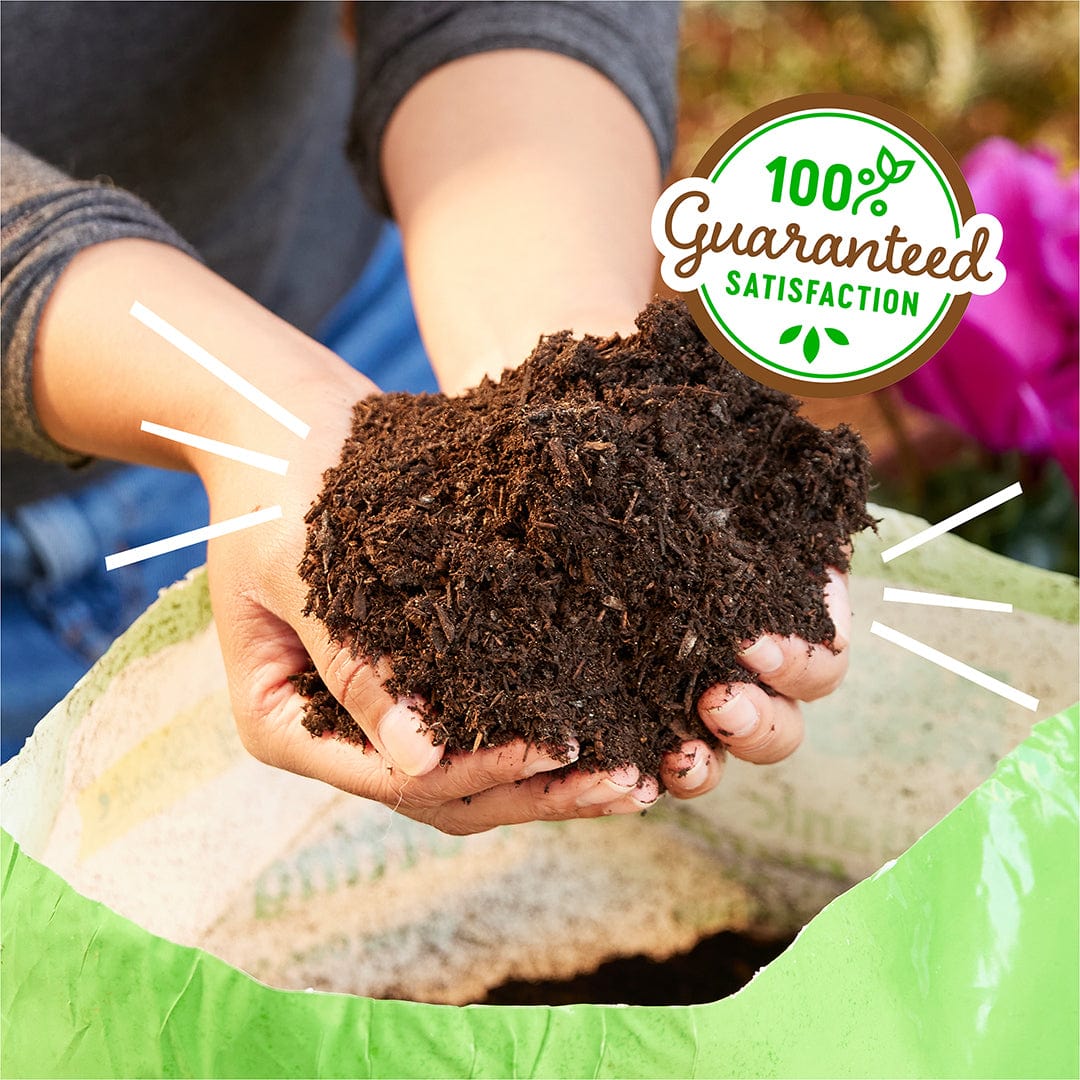 Hands holding rich, dark organic potting mix over an open green and white bag with a satisfaction guarantee badge. - Organic All-Purpose Potting Mix Specialty Blend (6 QT) - Default Title - Back to the Roots