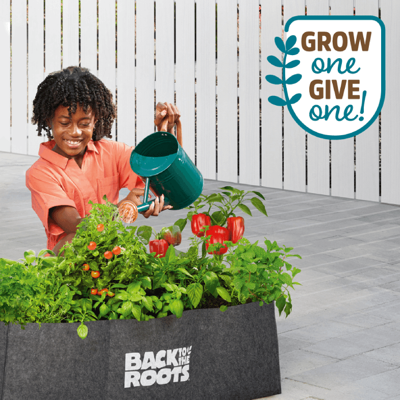 Grow One, Give One’ campaign graphic: share your garden photo and Back to the Roots donates a kit to a school.