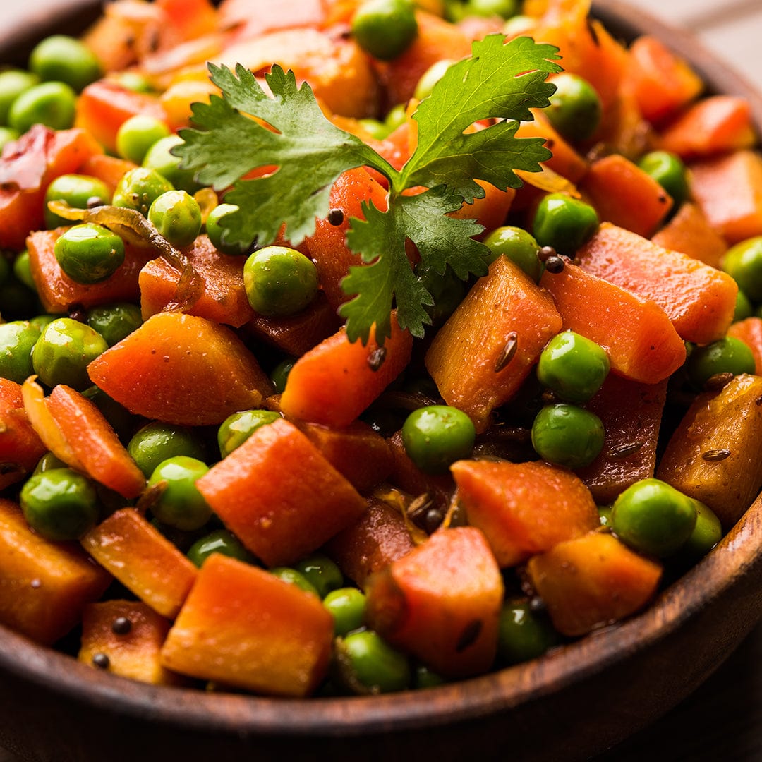 Cooked green peas and diced carrots garnished with fresh cilantro in a wooden bowl. - Organic Pea Seeds — 'Green Arrow' - Default Title - Back to the Roots
