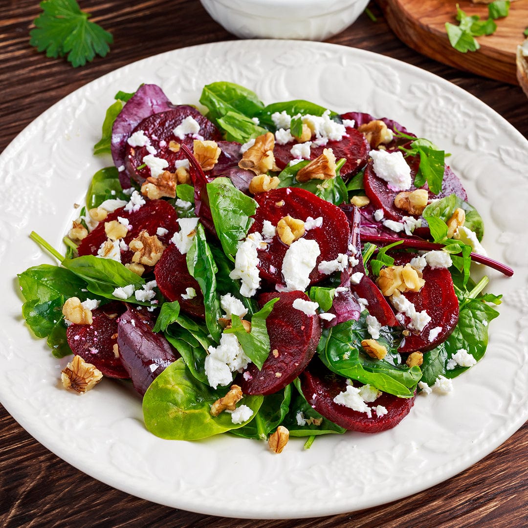 Fresh Chioggia beet salad with goat cheese, spinach, walnuts, and herbs on white plate. - Organic Beet Seeds — 'Chioggia' - Default Title - Back to the Roots