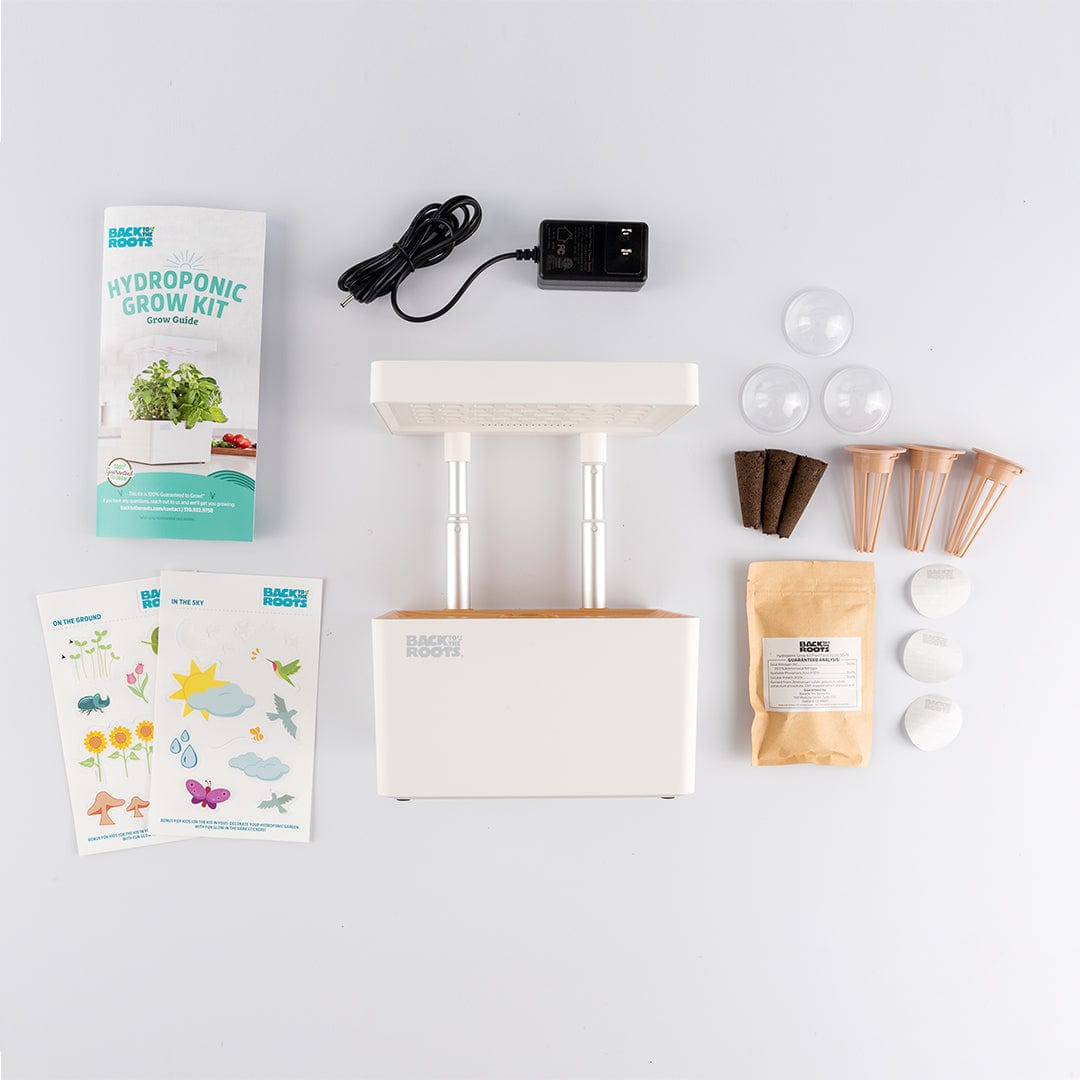 Compact white LED indoor garden kit with light panel, seed starter pods, soil, and instruction cards laid out on white. - Online Exclusive: Back to the Roots LED Indoor Garden - Default Title - Back to the Roots