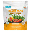 A bag of Back to the Roots Natural & Organic EDIBLES Plant Food, a premium garden fertilizer, showcases vegetables and product benefits on the front.