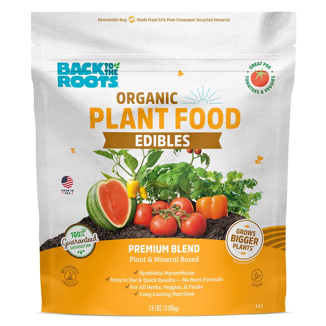 A bag of Back to the Roots Natural & Organic EDIBLES Plant Food, a premium garden fertilizer, showcases vegetables and product benefits on the front.