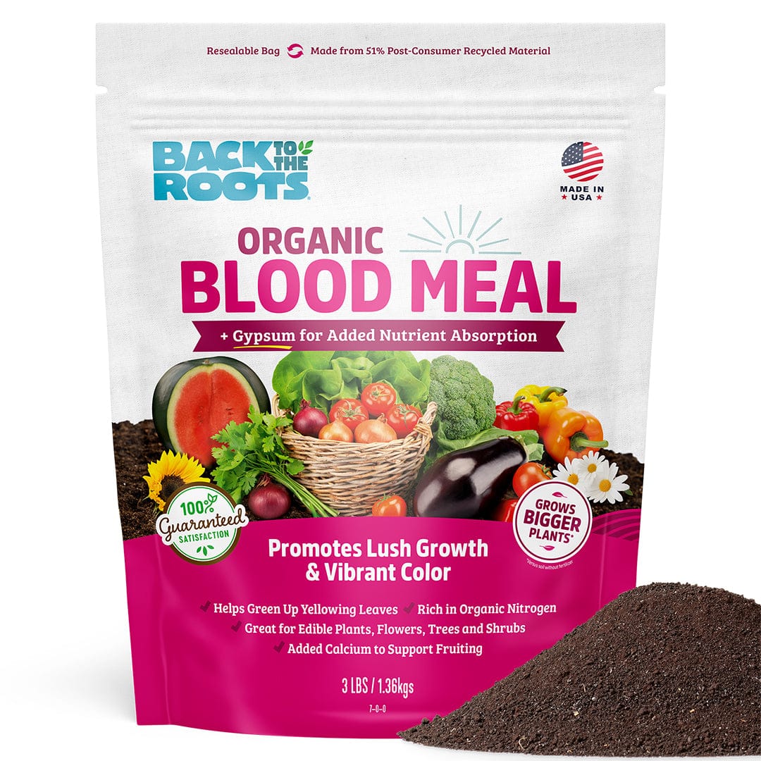 A 3lb bag of Back to the Roots Organic Blood Meal with Gypsum sits beside a pile of dark brown, high-nitrogen fertilizer. The packaging highlights benefits for plant growth and features images of vegetables and flowers.