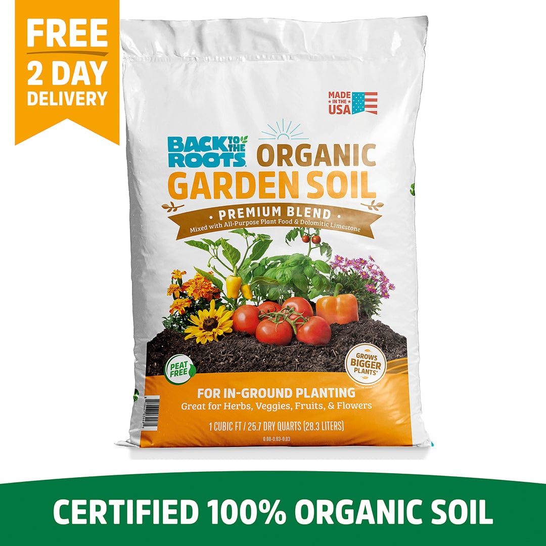 A 1 cu.ft. bag of Back to the Roots Organic Premium Blend Garden Soil, featuring vegetables and flowers on the package, is labeled as certified 100% organic, natural garden soil made in the USA.
