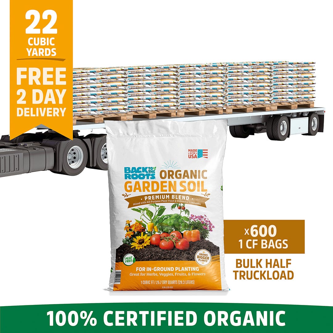 A flatbed truck loaded with Back to the Roots Organic Garden Soil: Bulk Half Truckload 22 Cubic Yards (10 pallets | 600 1CF bags), 100% certified organic and enriched with natural plant food.