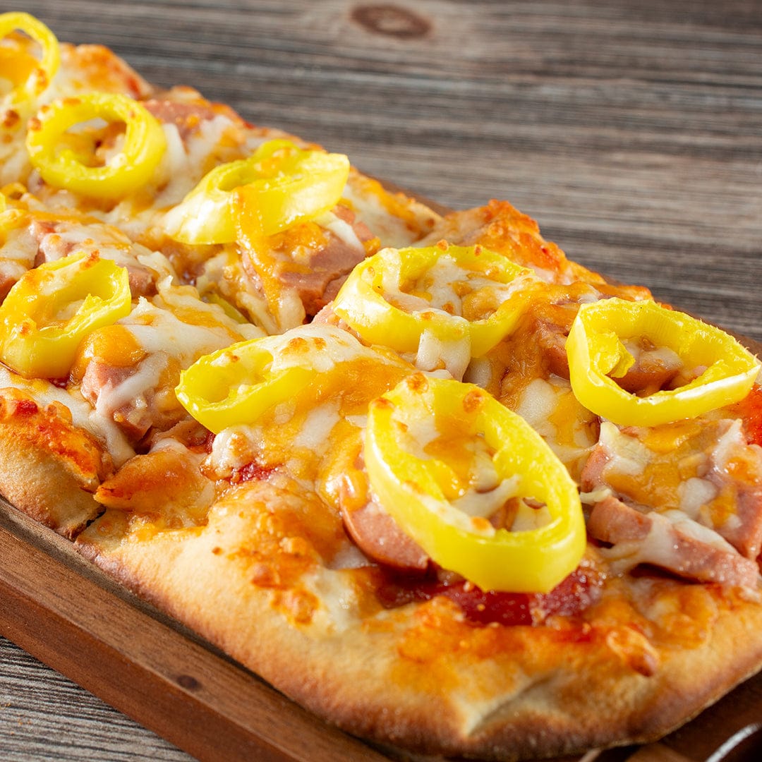 Fresh yellow pepperoncini rings atop melted cheese on a golden-brown crust pizza slice. - Organic Pepper Seeds — 'Pepperoncini' - Default Title - Back to the Roots